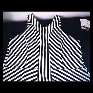 Torrid Sleeveless Flare Top